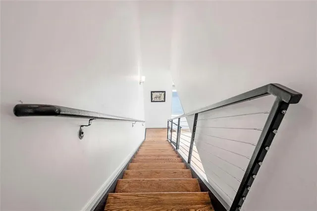 a hallway with wooden floor