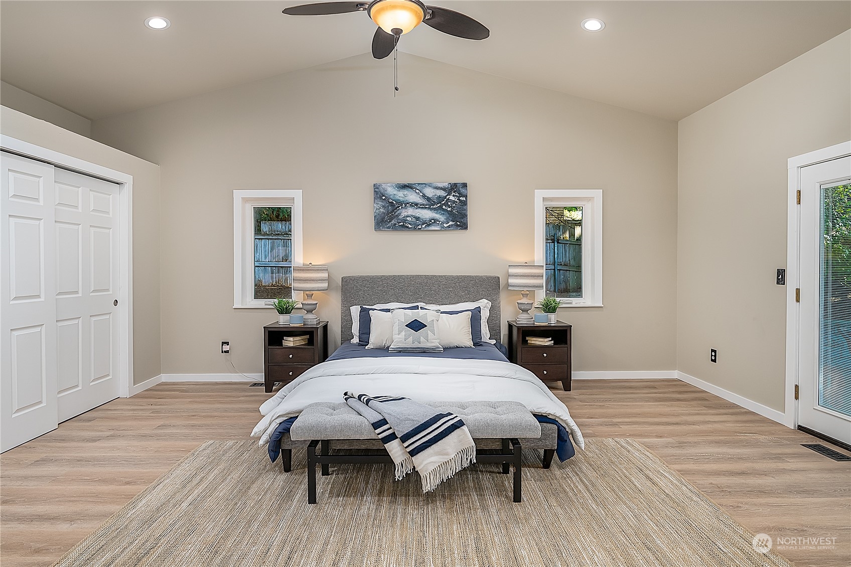 24121 6th Place West Bothell, WA 98021 - Photo 13 of 32 a bedroom with a bed and wooden floor
