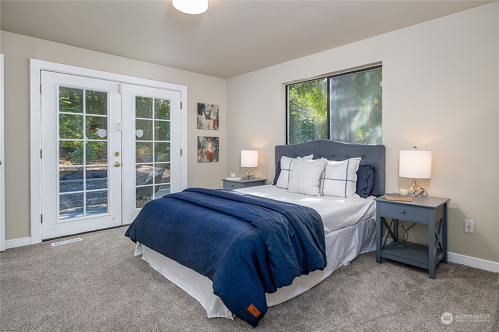 24121 6th Place West Bothell, WA 98021 - Photo 19 of 32 a bedroom with a bed and a window