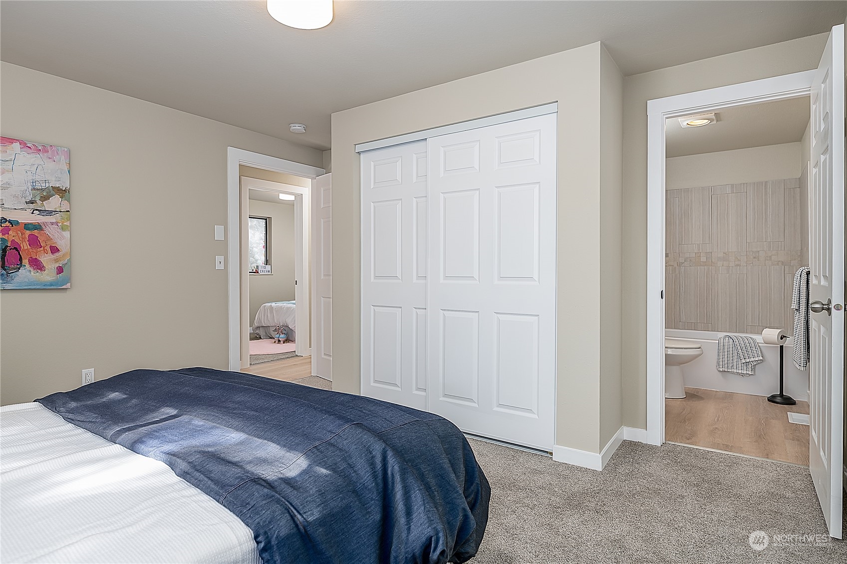 24121 6th Place West Bothell, WA 98021 - Photo 20 of 32 a bedroom with a bed and view of bathroom