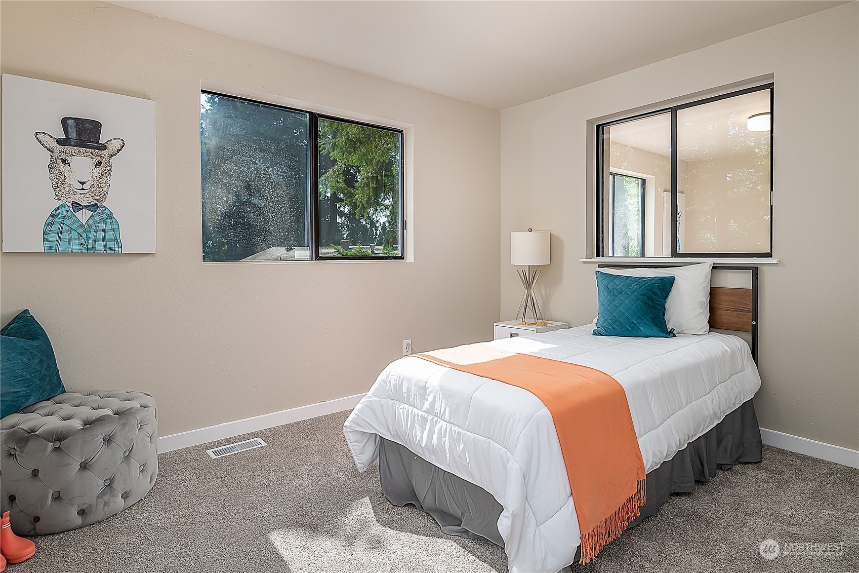 24121 6th Place West Bothell, WA 98021 - Photo 23 of 32 a bedroom with a bed and a window