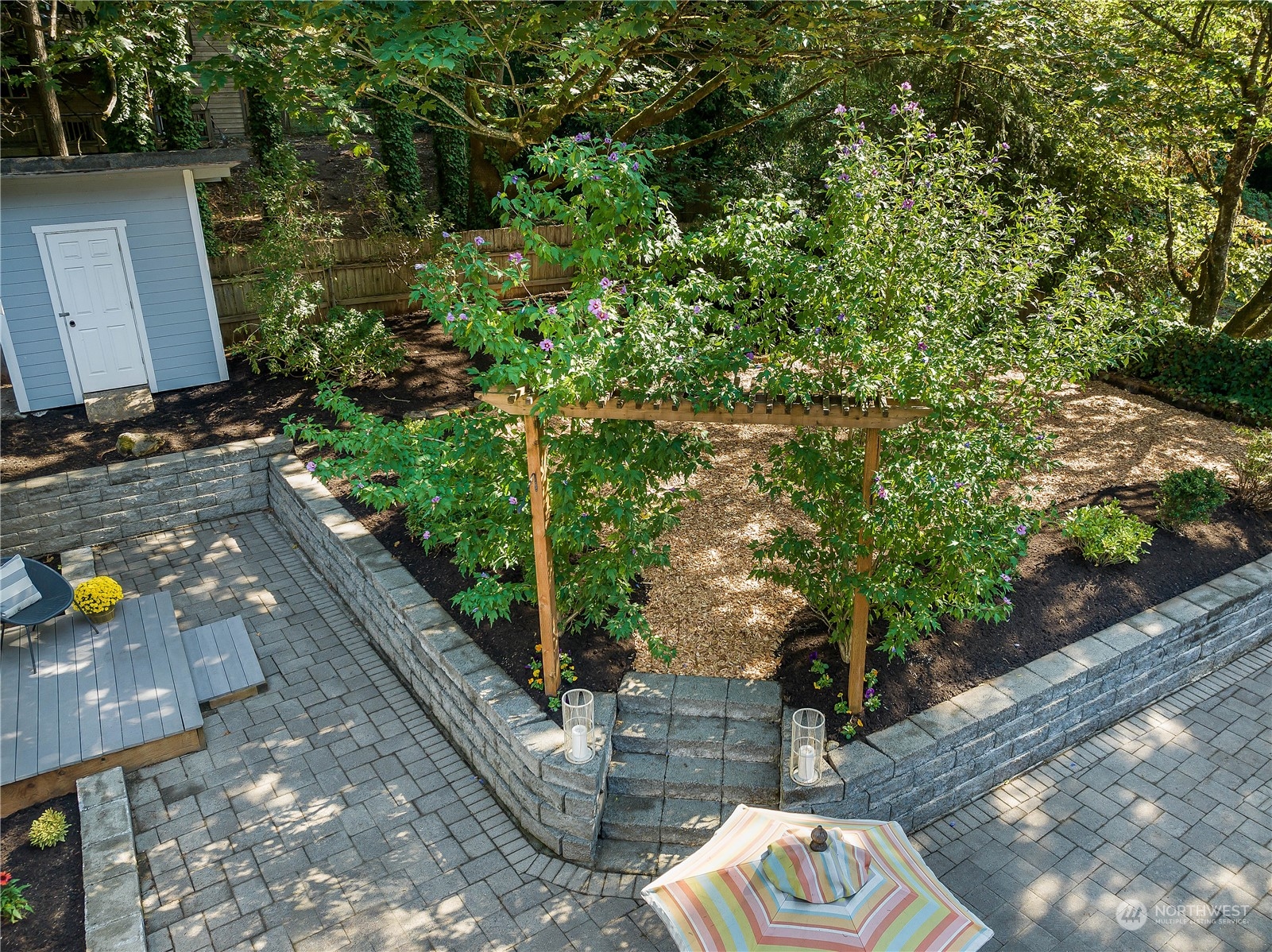 24121 6th Place West Bothell, WA 98021 - Photo 26 of 32 a view of a backyard with sitting area