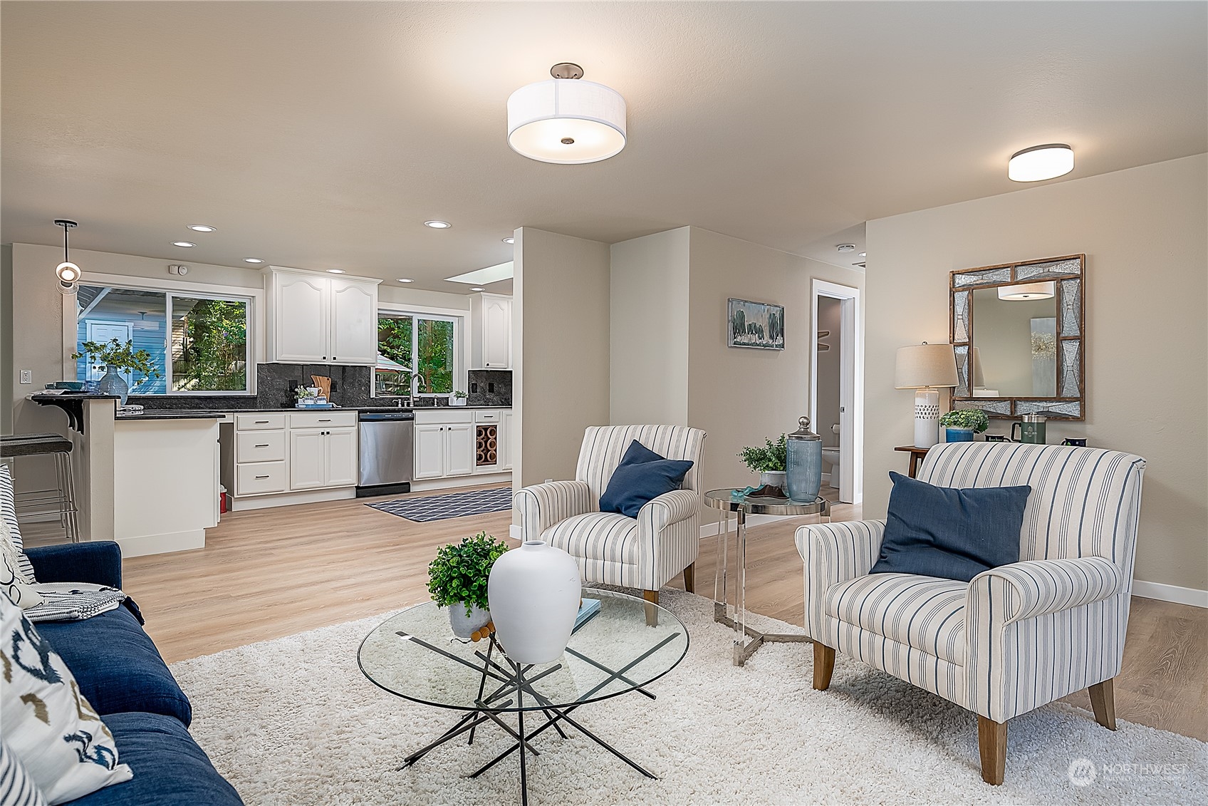 24121 6th Place West Bothell, WA 98021 - Photo 3 of 32 a living room with furniture and kitchen view