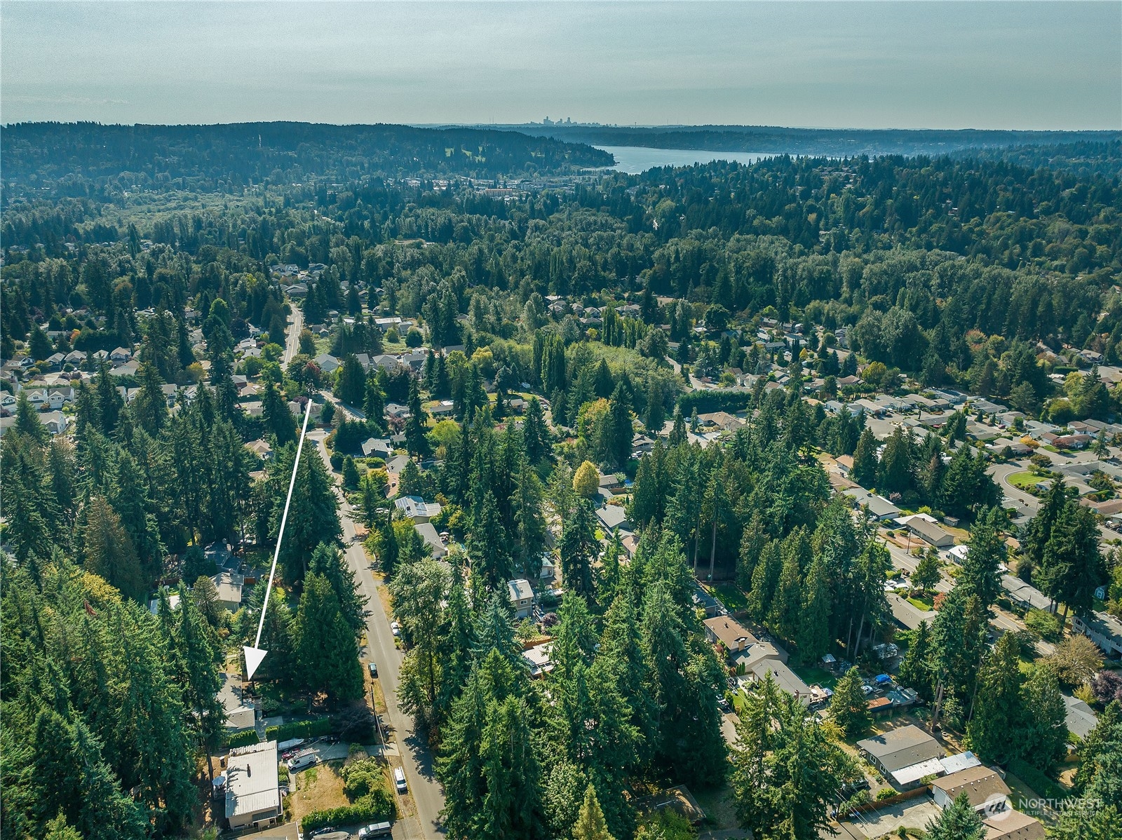 24121 6th Place West Bothell, WA 98021 - Photo 31 of 32 an aerial view of residential houses with outdoor space and trees