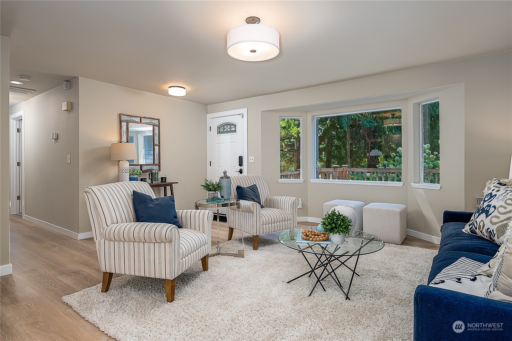 24121 6th Place West Bothell, WA 98021 - Photo 5 of 32 a living room with furniture rug and window