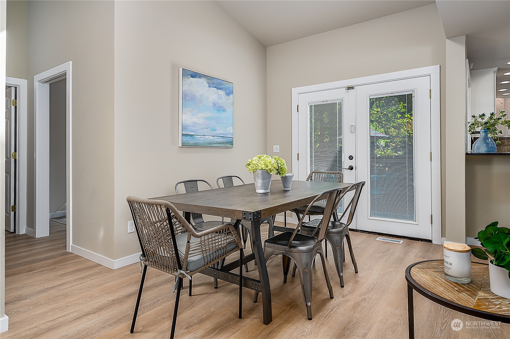 24121 6th Place West Bothell, WA 98021 - Photo 10 of 32 a view of a dining room with furniture and wooden floor