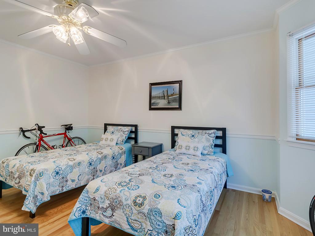 32 Harpoon Road Ocean Pines, MD 21811 - Photo 28 of 37 a bedroom with two beds and wooden floor