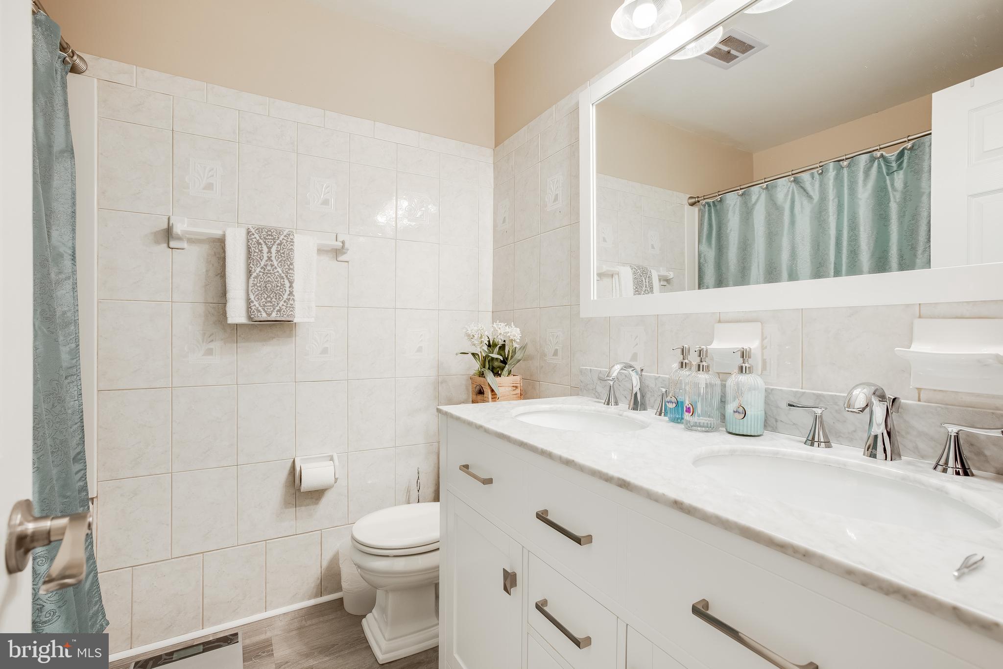 1503 Ainsley Road Silver Spring, MD 20904 - Photo 19 of 35 Owners Bathroom w/Double sink Vanity