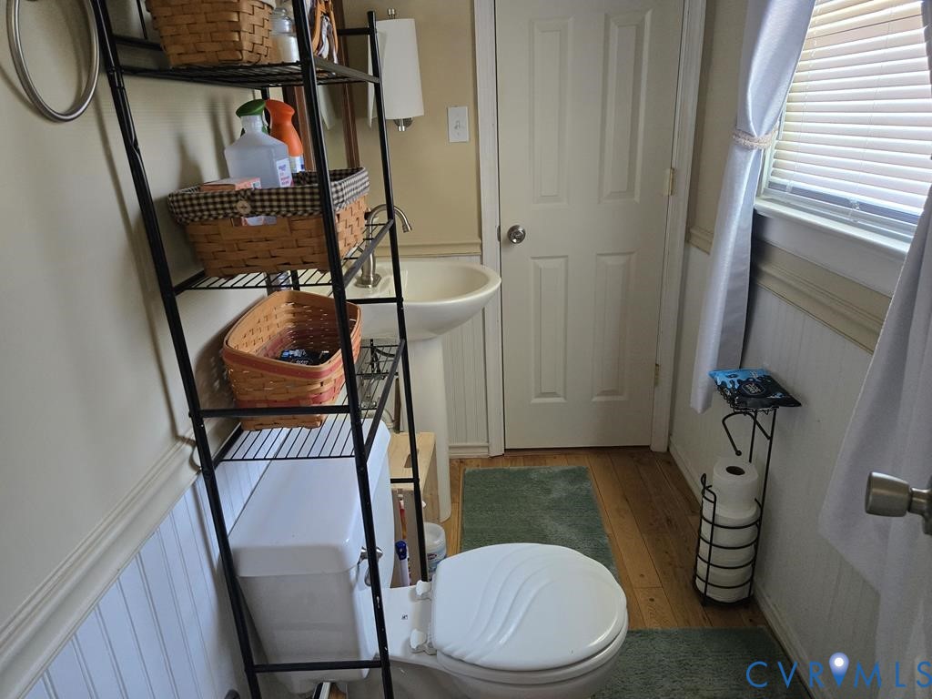 6 Mahan Road Farmville, VA 23901 - Photo 11 of 30 a bathroom with a toilet mirror and vanity