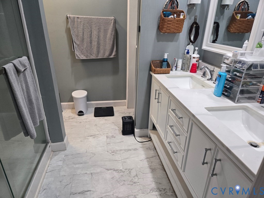 6 Mahan Road Farmville, VA 23901 - Photo 15 of 30 a bathroom with a sink a mirror and a toilet