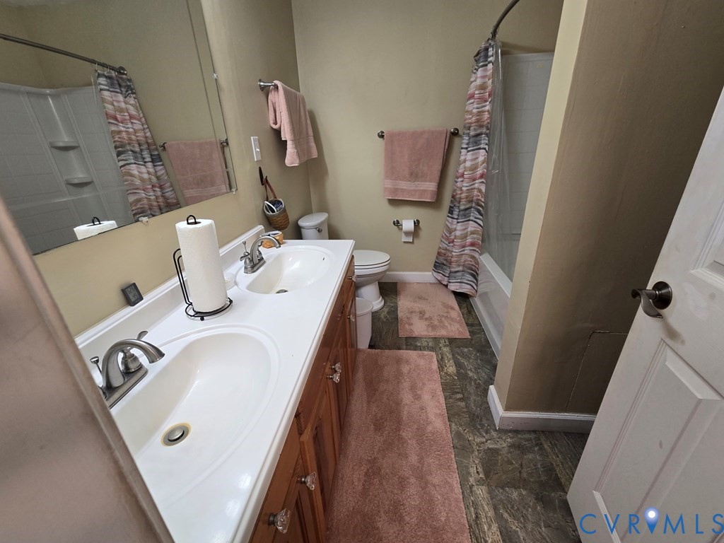 6 Mahan Road Farmville, VA 23901 - Photo 19 of 30 a bathroom with sink and mirror
