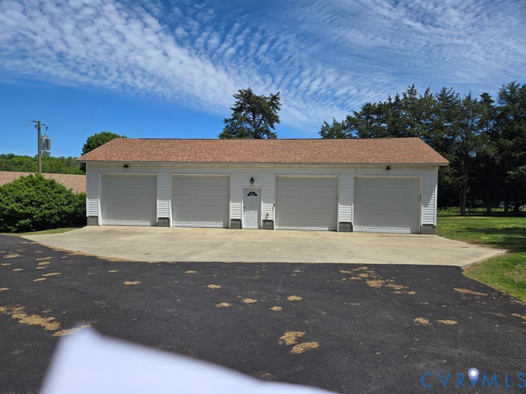 6 Mahan Road Farmville, VA 23901 - Photo 21 of 30 a front view of a house with a yard and garage