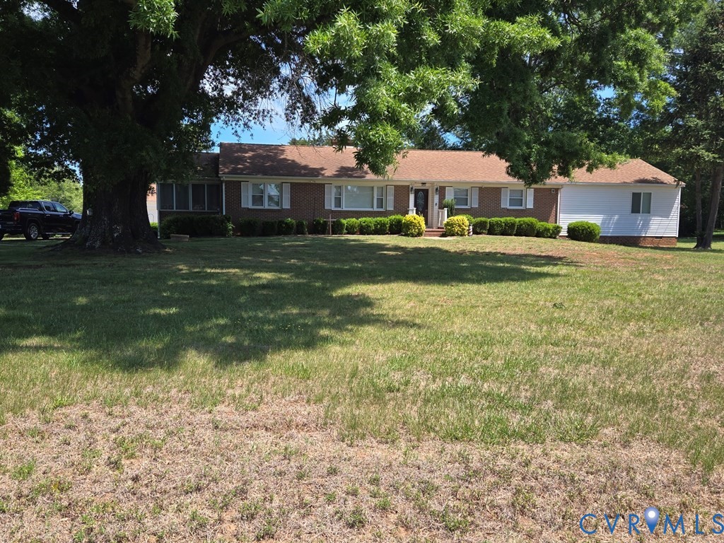 6 Mahan Road Farmville, VA 23901 - Photo 25 of 30 a front view of a house with a garden and trees