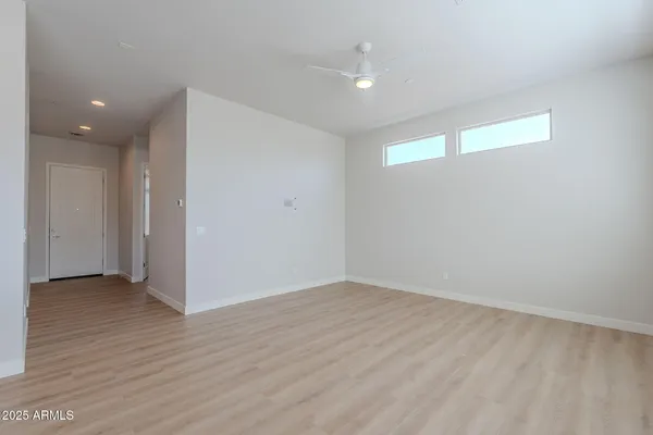 an aerial view of a house with garden space and street view