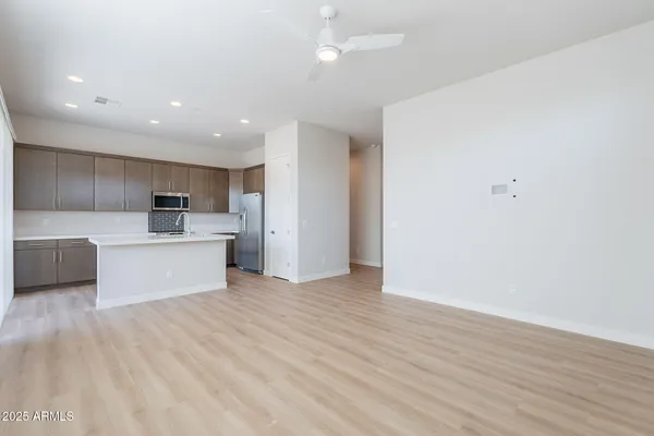 a view of water fountain with an outdoor seating
