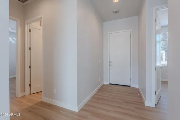 a view of a cafe with a couple of people seating