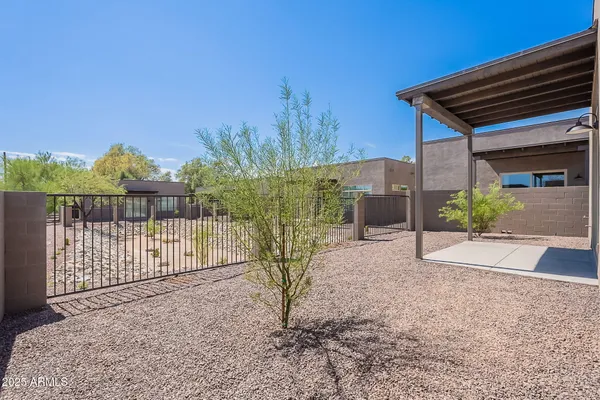 a view of a house with a street