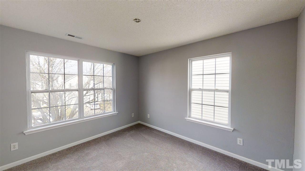 4348 Cardinal Grove Boulevard Raleigh, NC 27616 - Photo 20 of 30 an empty room with a window