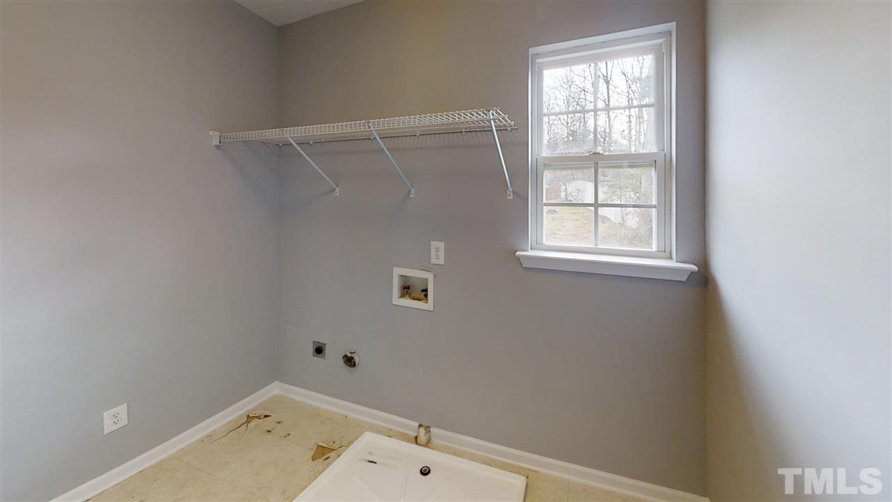4348 Cardinal Grove Boulevard Raleigh, NC 27616 - Photo 27 of 30 an empty room with a window