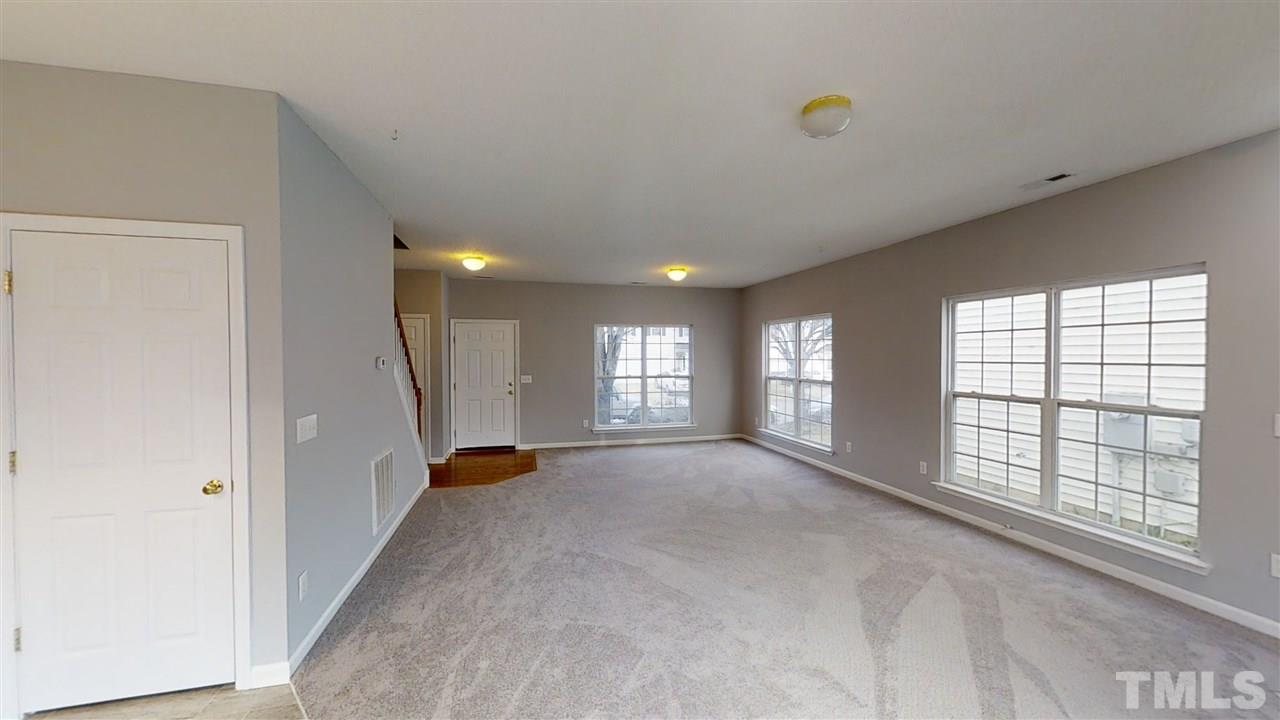 4348 Cardinal Grove Boulevard Raleigh, NC 27616 - Photo 7 of 30 a view of an empty room with a window