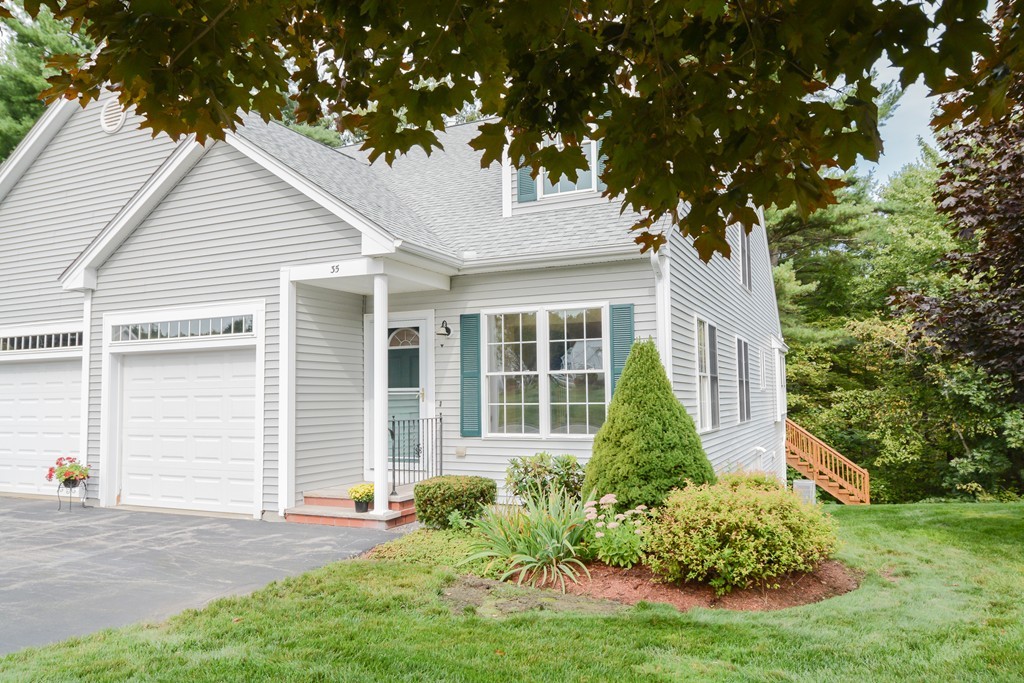 35 Hadleigh Road, Unit 35 Windham, NH 03087 - Photo 1 of 39 front view of a house with a yard