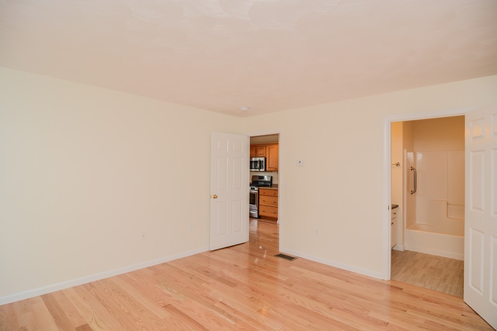 35 Hadleigh Road, Unit 35 Windham, NH 03087 - Photo 21 of 39 a view of an empty room