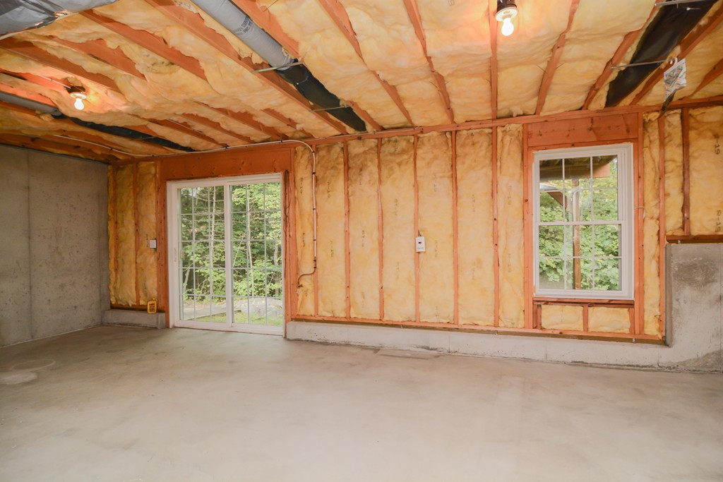 35 Hadleigh Road, Unit 35 Windham, NH 03087 - Photo 37 of 39 a view of an empty room with a window