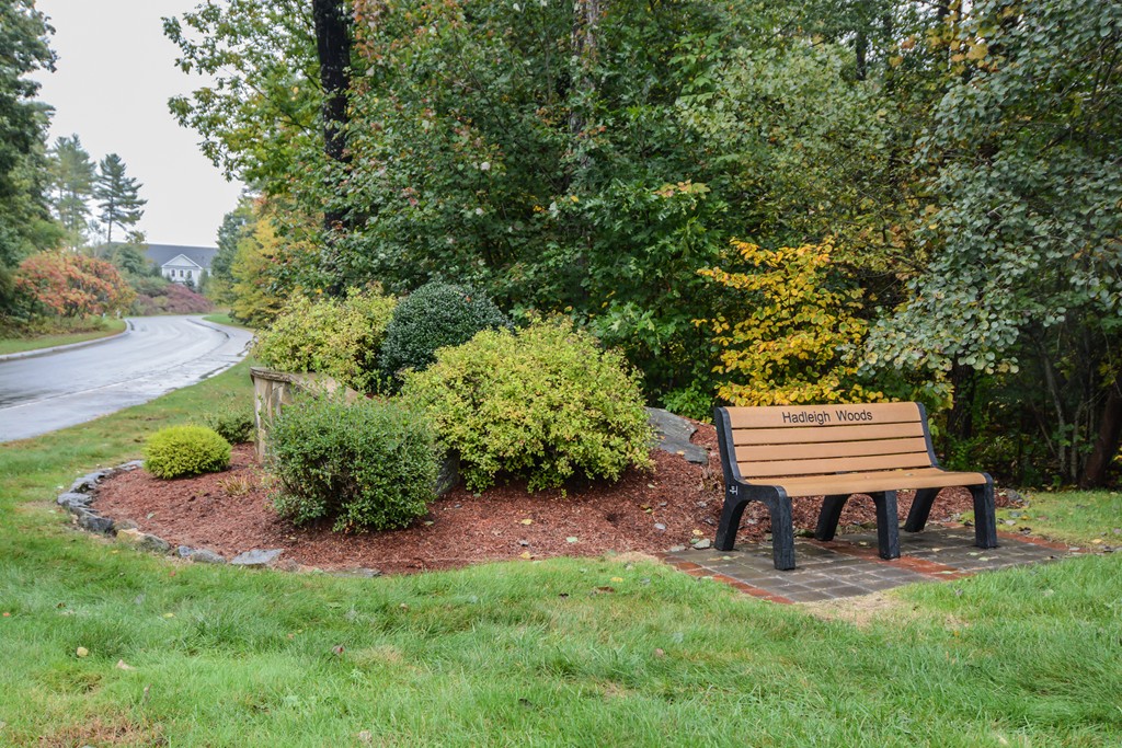 35 Hadleigh Road, Unit 35 Windham, NH 03087 - Photo 38 of 39 a view of a backyard with sitting area