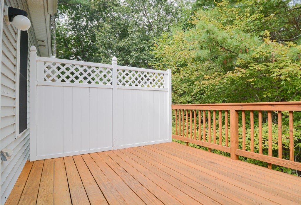 35 Hadleigh Road, Unit 35 Windham, NH 03087 - Photo 4 of 39 a view of balcony with wooden floor