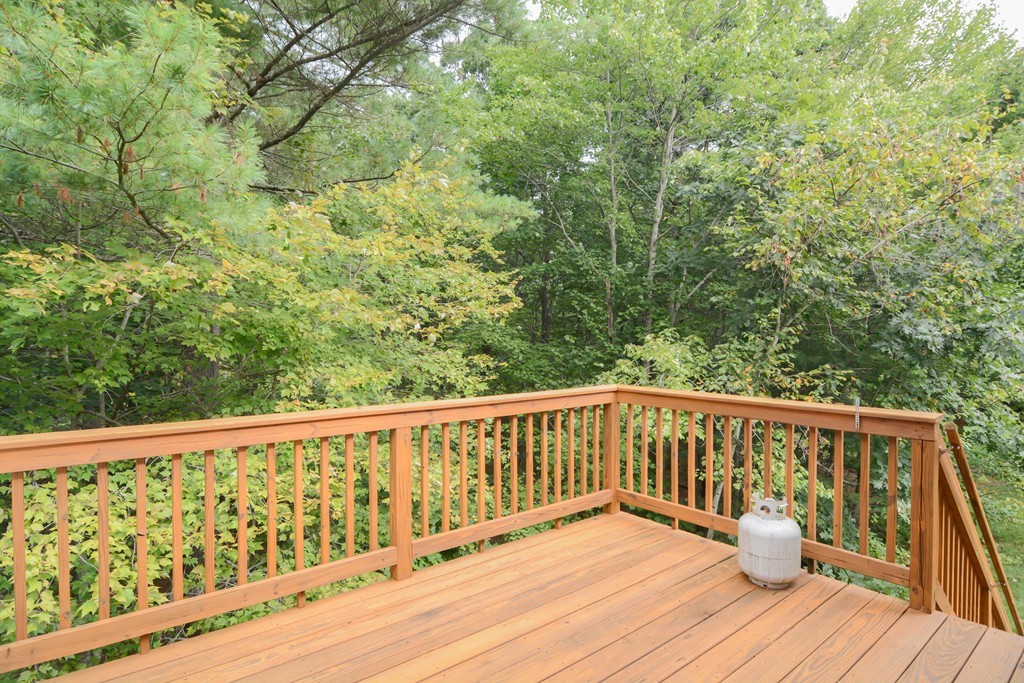 35 Hadleigh Road, Unit 35 Windham, NH 03087 - Photo 5 of 39 a view of wooden deck