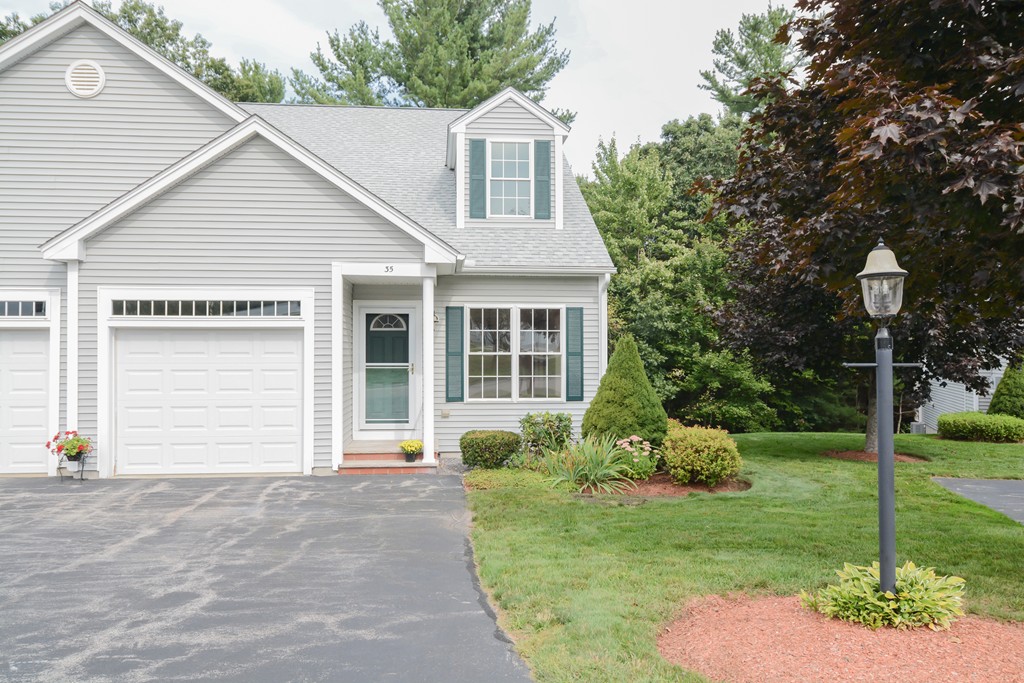 35 Hadleigh Road, Unit 35 Windham, NH 03087 - Photo 6 of 39 a front view of a house with a yard