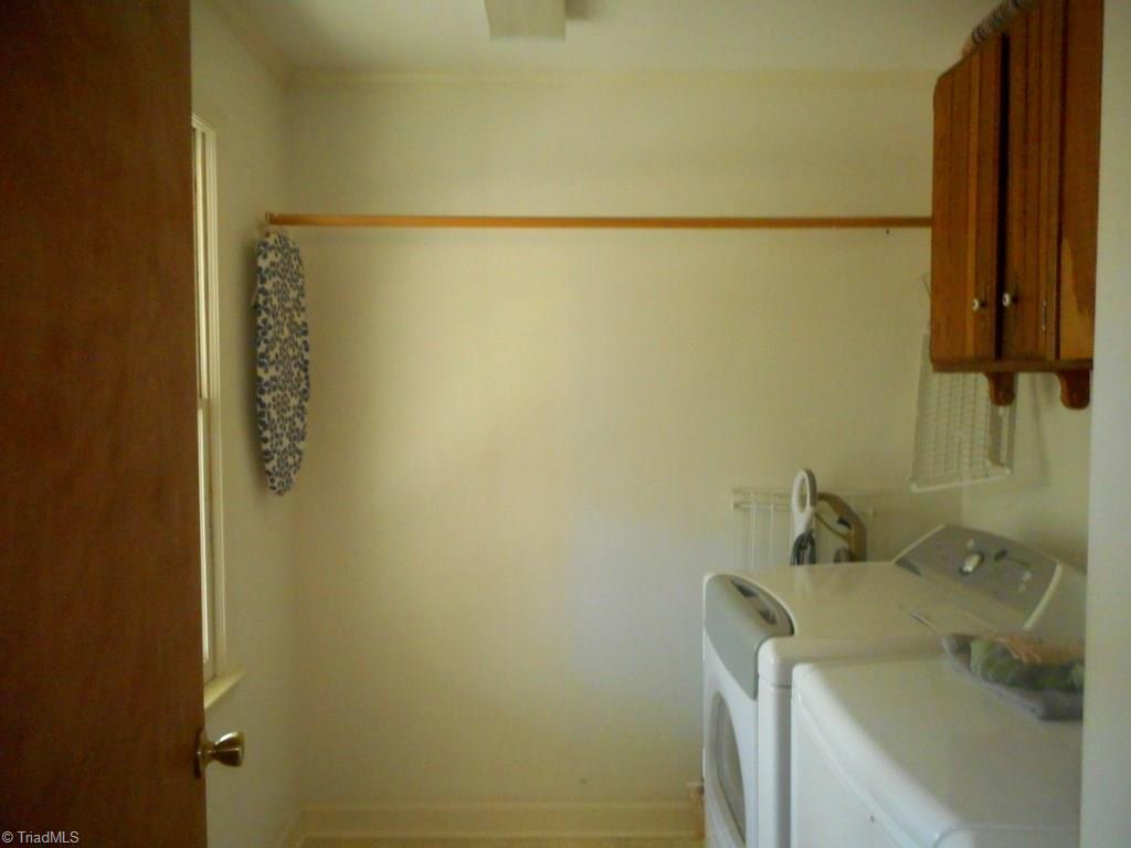 8541 Linville Road Oak Ridge, NC 27310 - Photo 12 of 29 Main floor laundry (2nd laundry hook ups on 2nd floor)