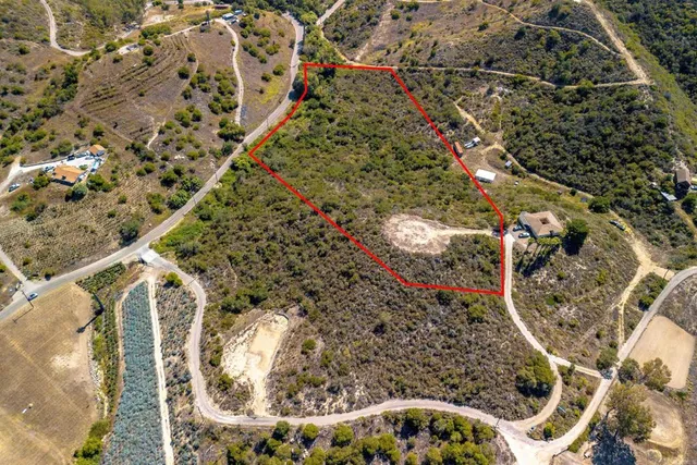 a bathroom with bathtub and shower