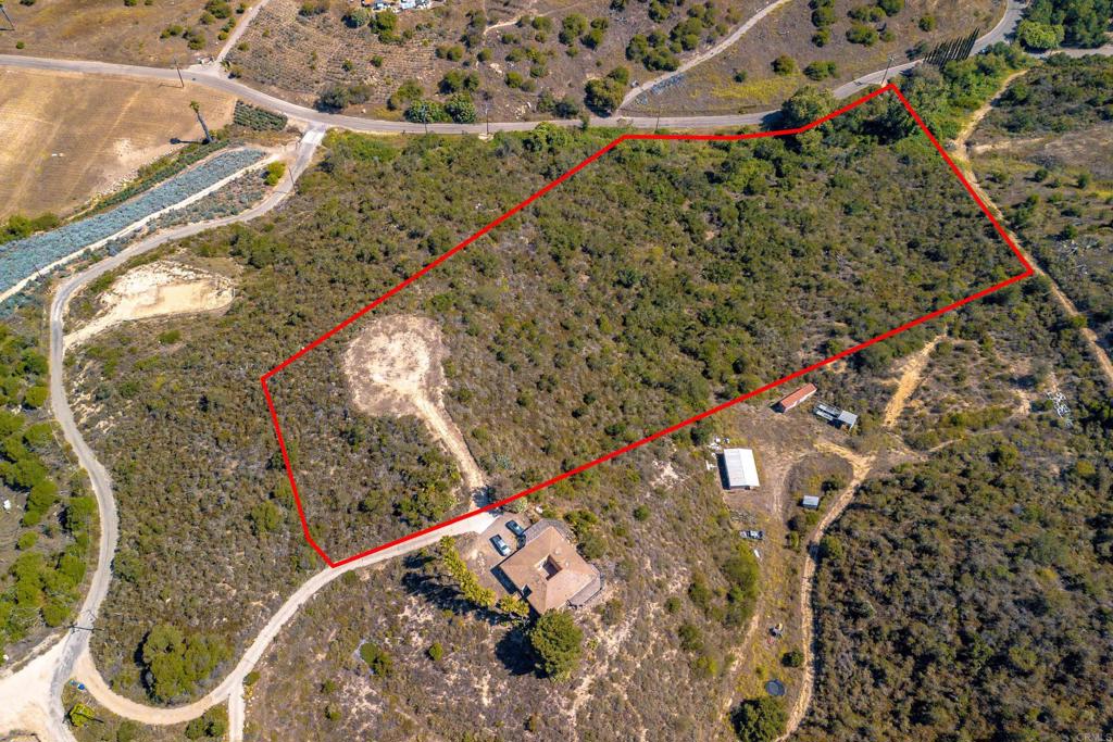 27 Daily Road Fallbrook, CA 92028 - Photo 17 of 34 an aerial view of a house with a yard and large trees