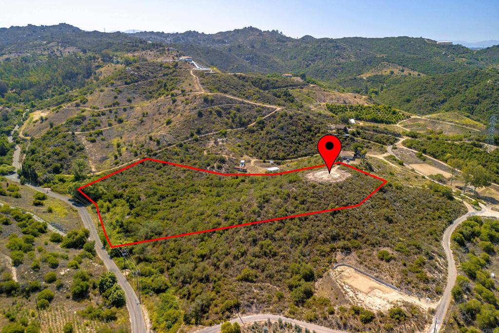 27 Daily Road Fallbrook, CA 92028 - Photo 7 of 34 a view of a lush green hillside and a houses