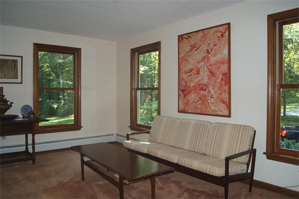 89 Scribner Road Tyngsborough, MA 01879 - Photo 5 of 30 a living room with furniture and a window