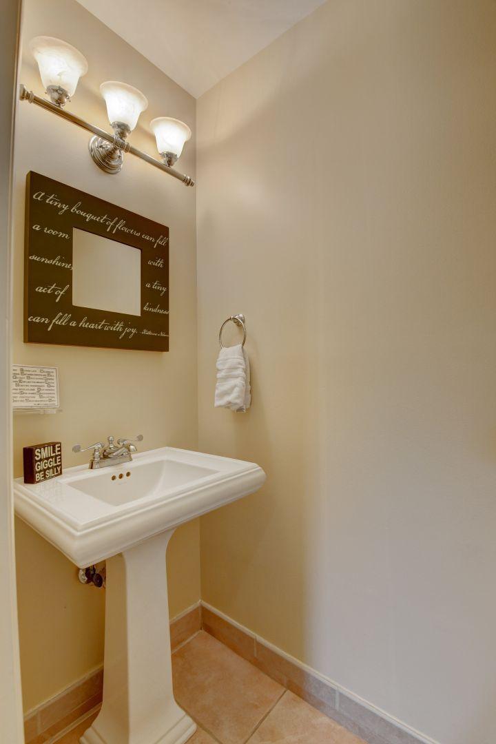 2422 Northwest 36th Street Boca Raton, FL 33431 - Photo 17 of 45 Powder room adjacent to kitchen