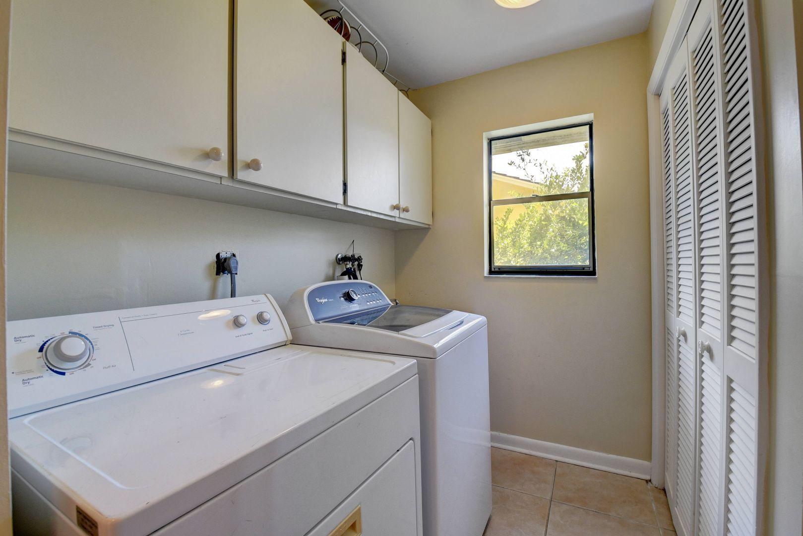 2422 Northwest 36th Street Boca Raton, FL 33431 - Photo 18 of 45 Inside laundry room with extra storage