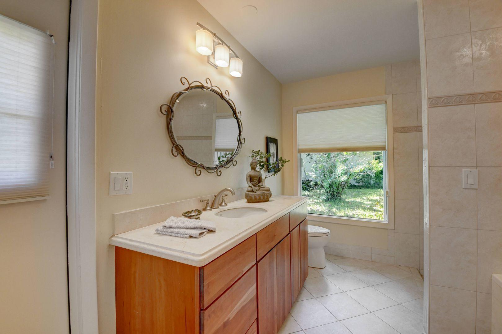 2422 Northwest 36th Street Boca Raton, FL 33431 - Photo 21 of 45 Door to outside from primary bathroom