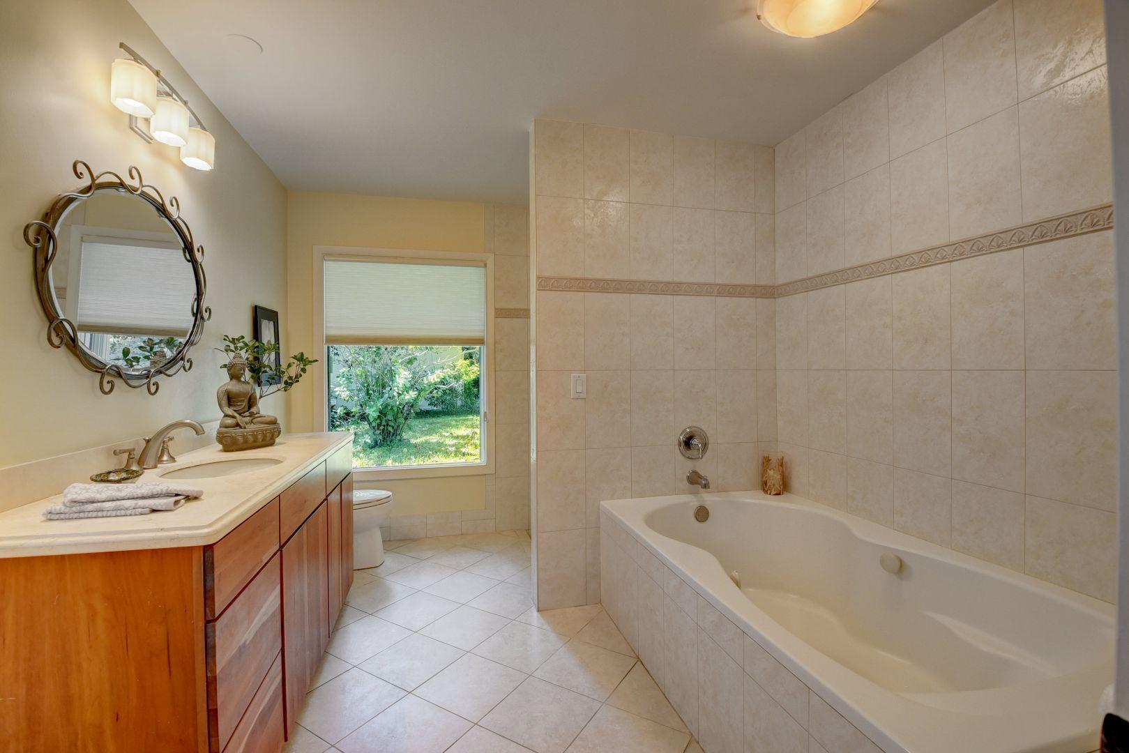 2422 Northwest 36th Street Boca Raton, FL 33431 - Photo 9 of 45 Updated bathroom with shower and tub