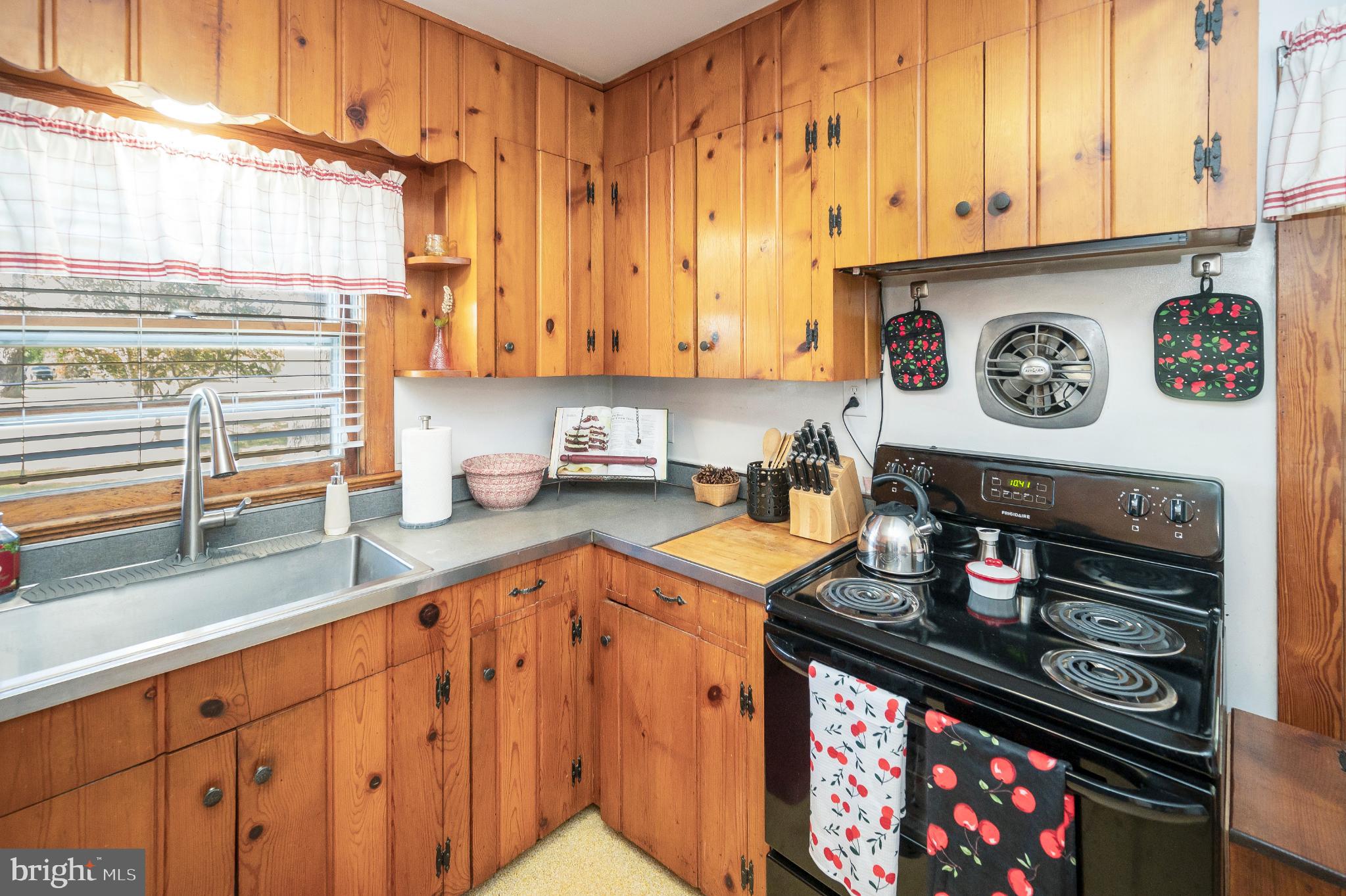 8625 Brock Road Spotsylvania, VA 22553 - Photo 14 of 47 Charming kitchen with rustic wooden accents.