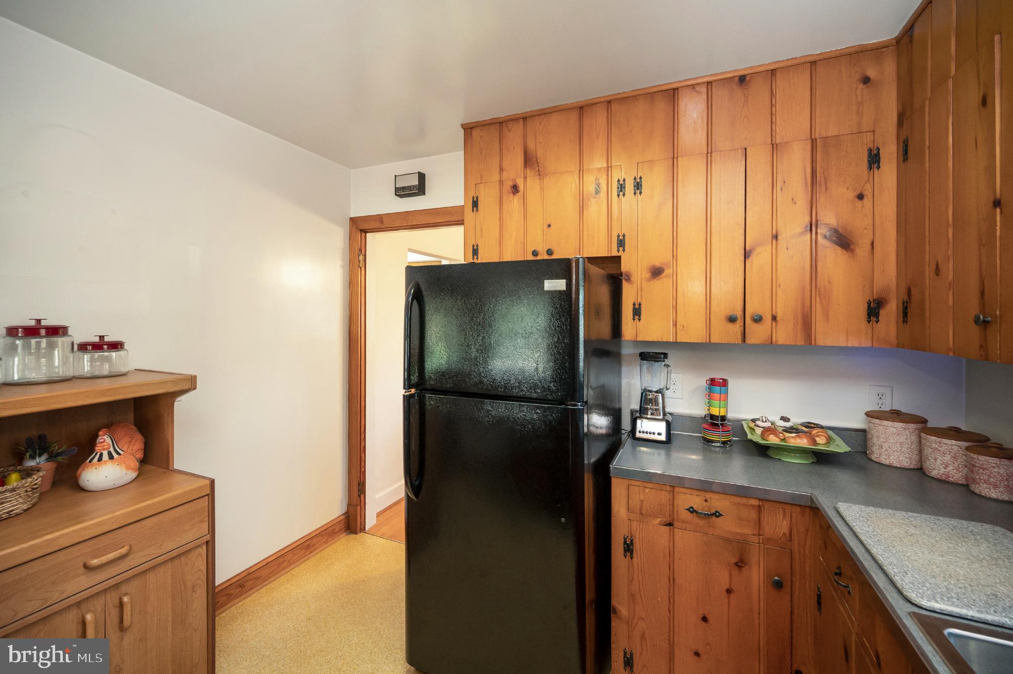 8625 Brock Road Spotsylvania, VA 22553 - Photo 15 of 47 Cozy kitchen with warm wooden accents.
