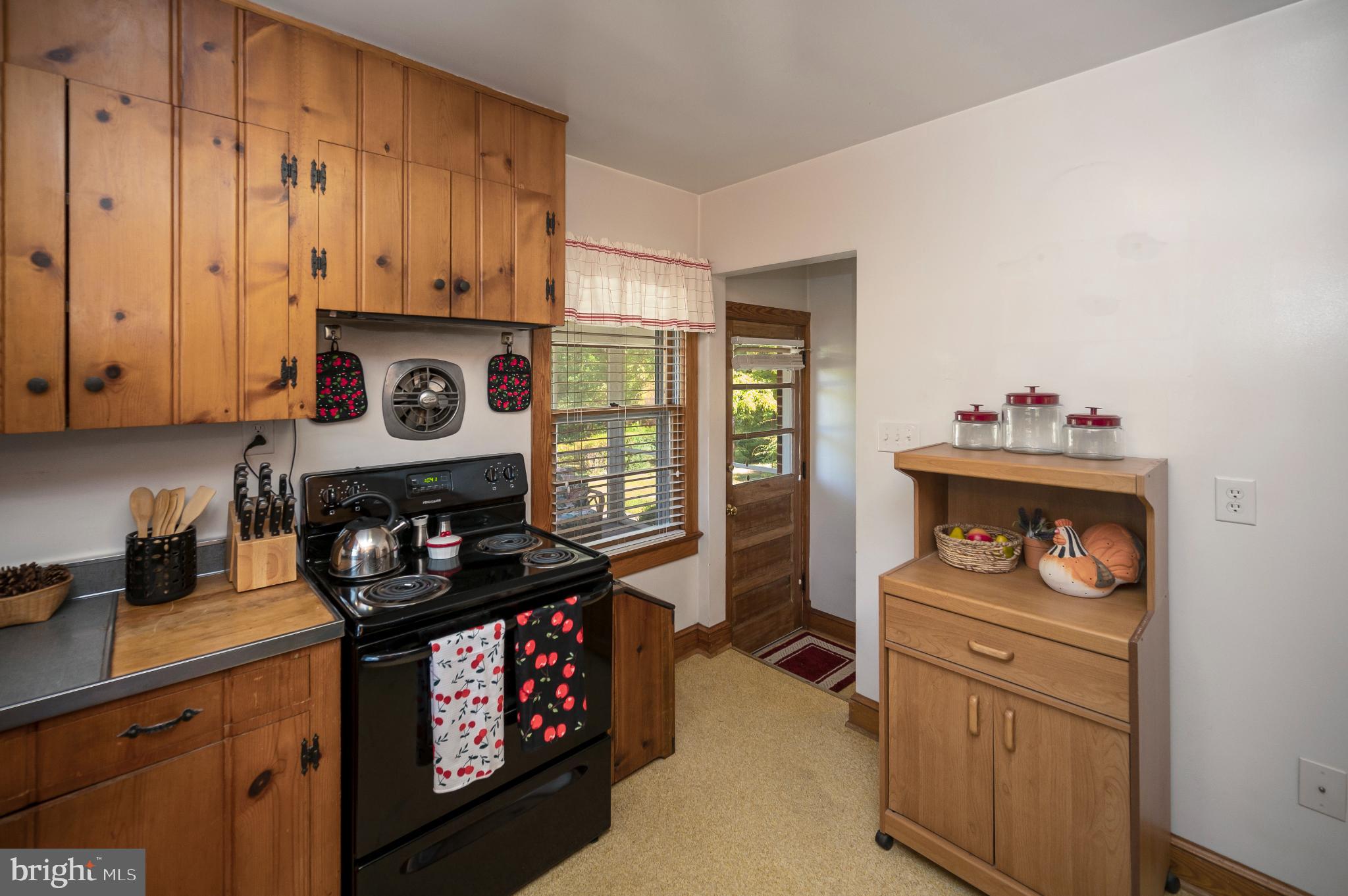 8625 Brock Road Spotsylvania, VA 22553 - Photo 16 of 47 Charming kitchen with rustic wooden accents.