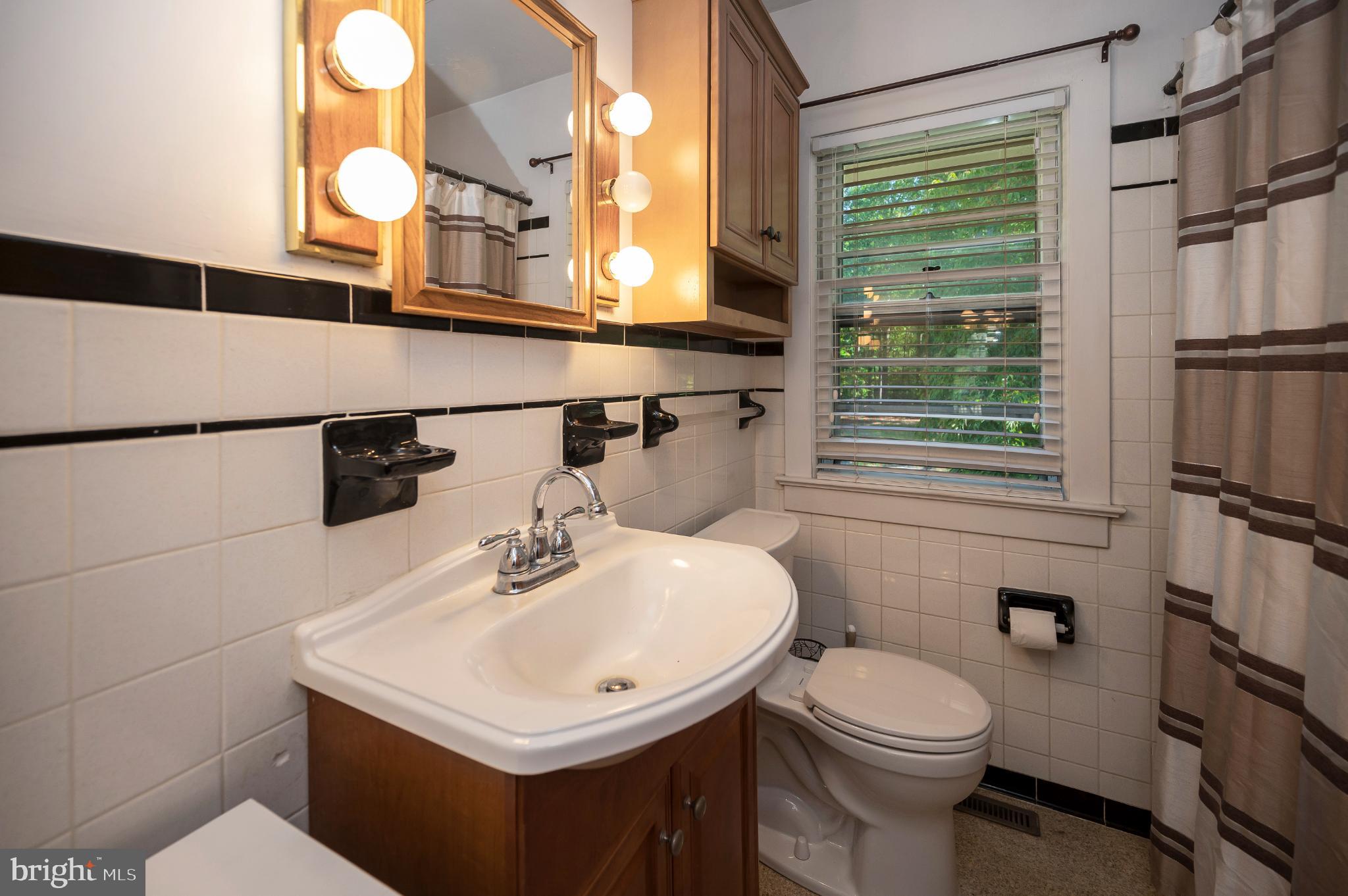 8625 Brock Road Spotsylvania, VA 22553 - Photo 19 of 47 Charming bathroom with classic tile accents.