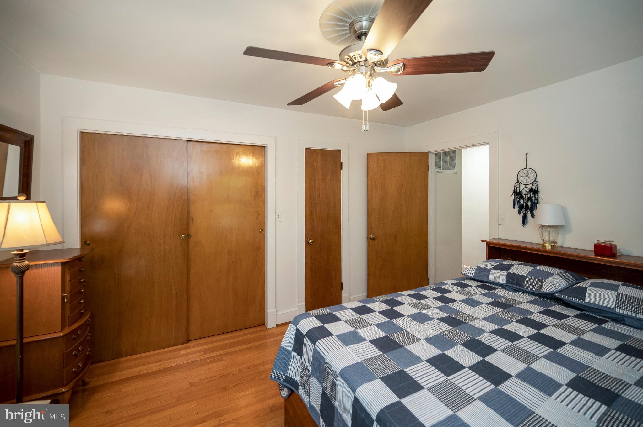 8625 Brock Road Spotsylvania, VA 22553 - Photo 23 of 47 Cozy bedroom with warm wooden accents.