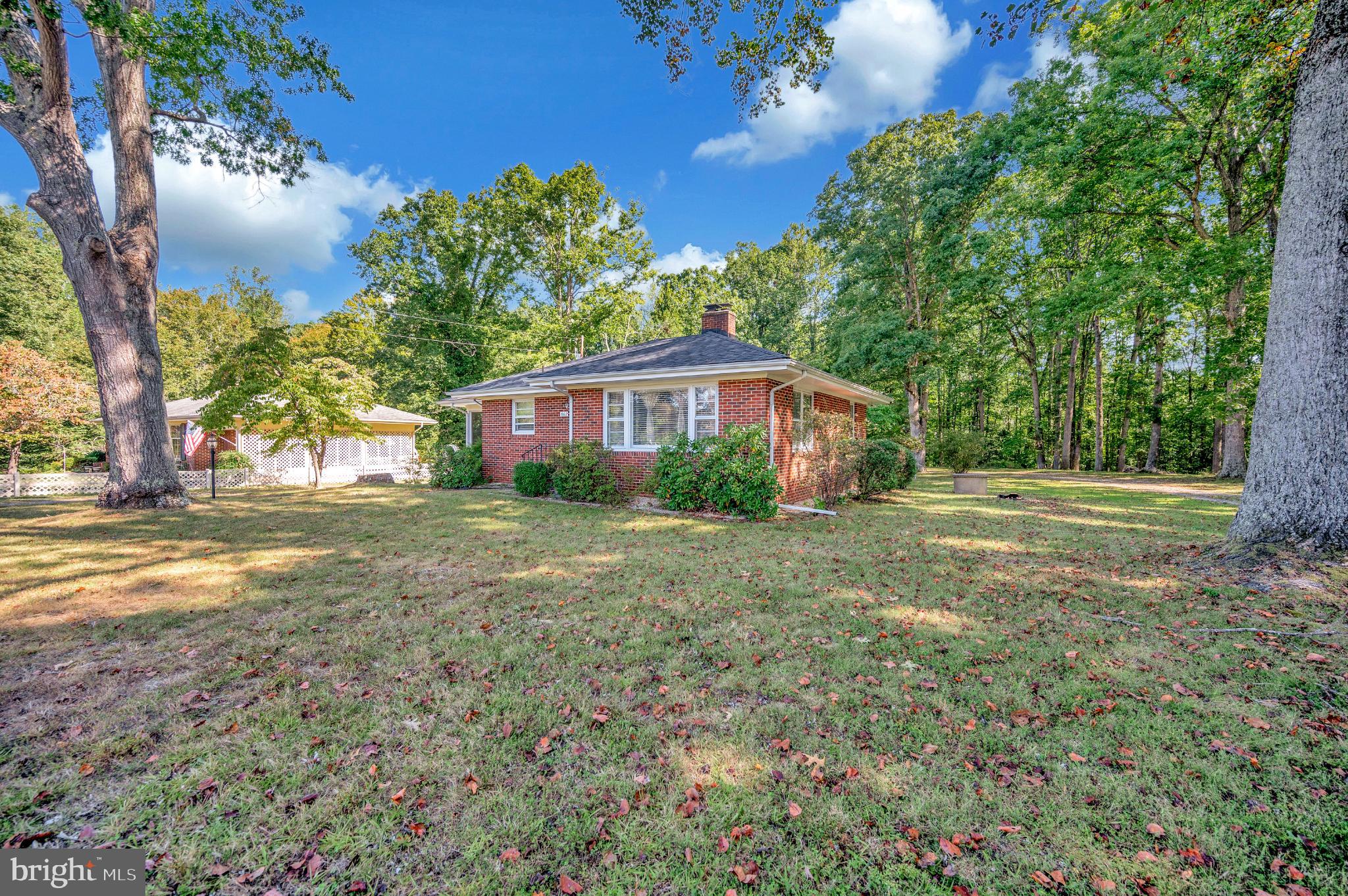 8625 Brock Road Spotsylvania, VA 22553 - Photo 39 of 47 Charming home nestled in lush greenery.