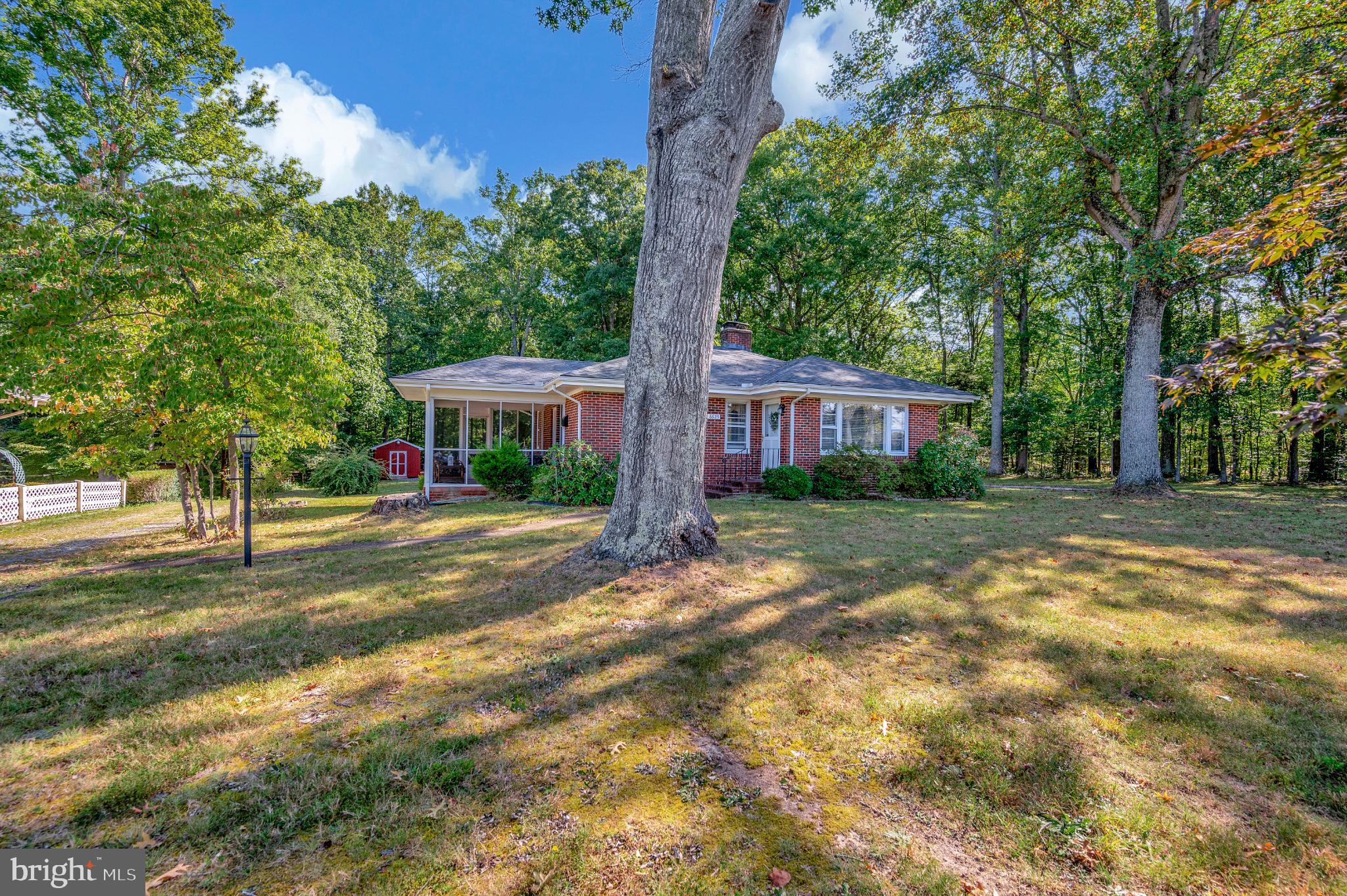 8625 Brock Road Spotsylvania, VA 22553 - Photo 41 of 47 Charming home nestled in serene greenery.