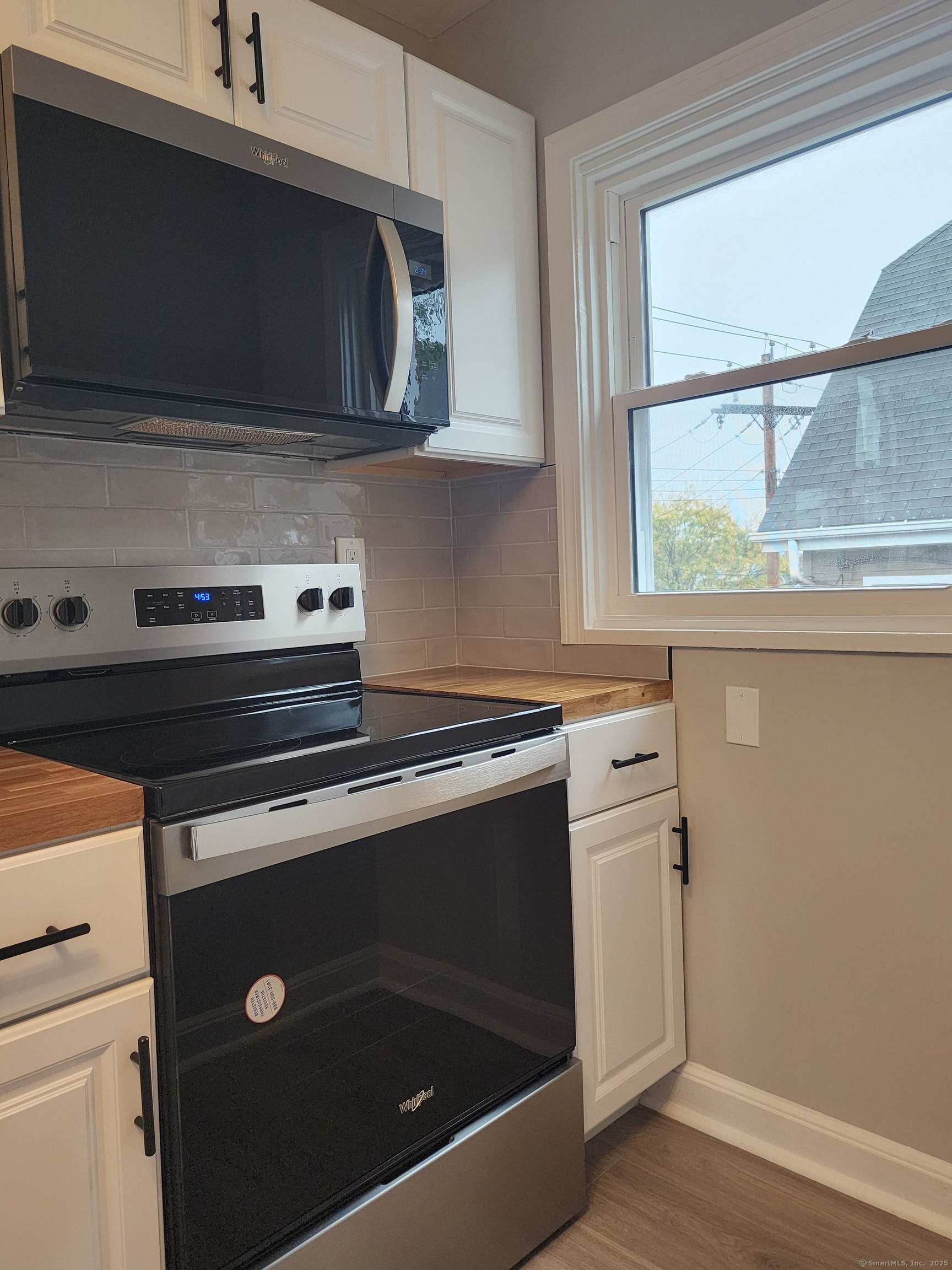 17 Shoreham Terrace Fairfield, CT 06824 - Photo 3 of 13 a stove top oven sitting inside of a kitchen