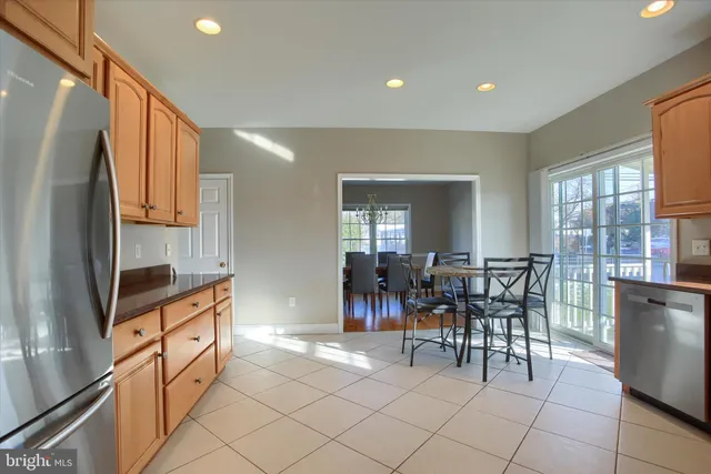 a view of a dining area with furniture window and wooden floor