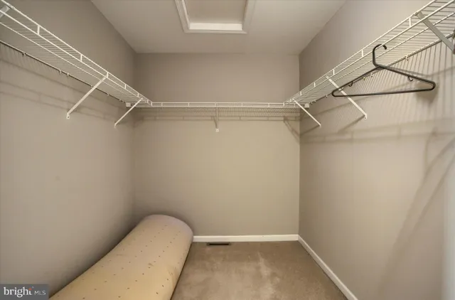 a view of small space with racks on the wall